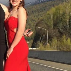 Size: 4, red strapless prom dress, sequins throughout back(anchorage, ak)